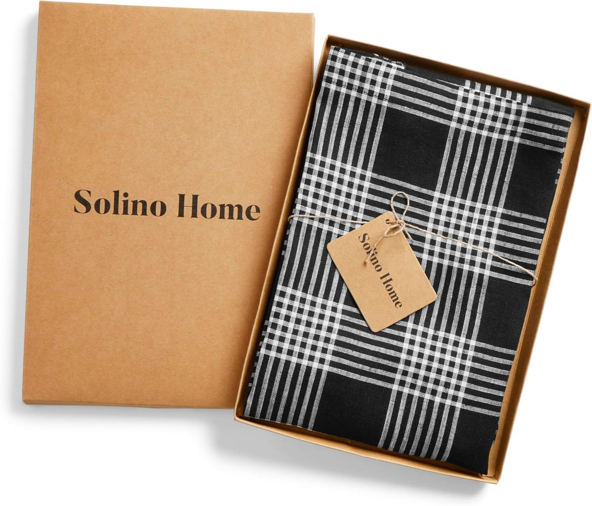 Solino Home Linen Bib Apron for Men & Women - Black and White Plaid Kitchen Apron with Front Pockets - Handcrafted from European Flax