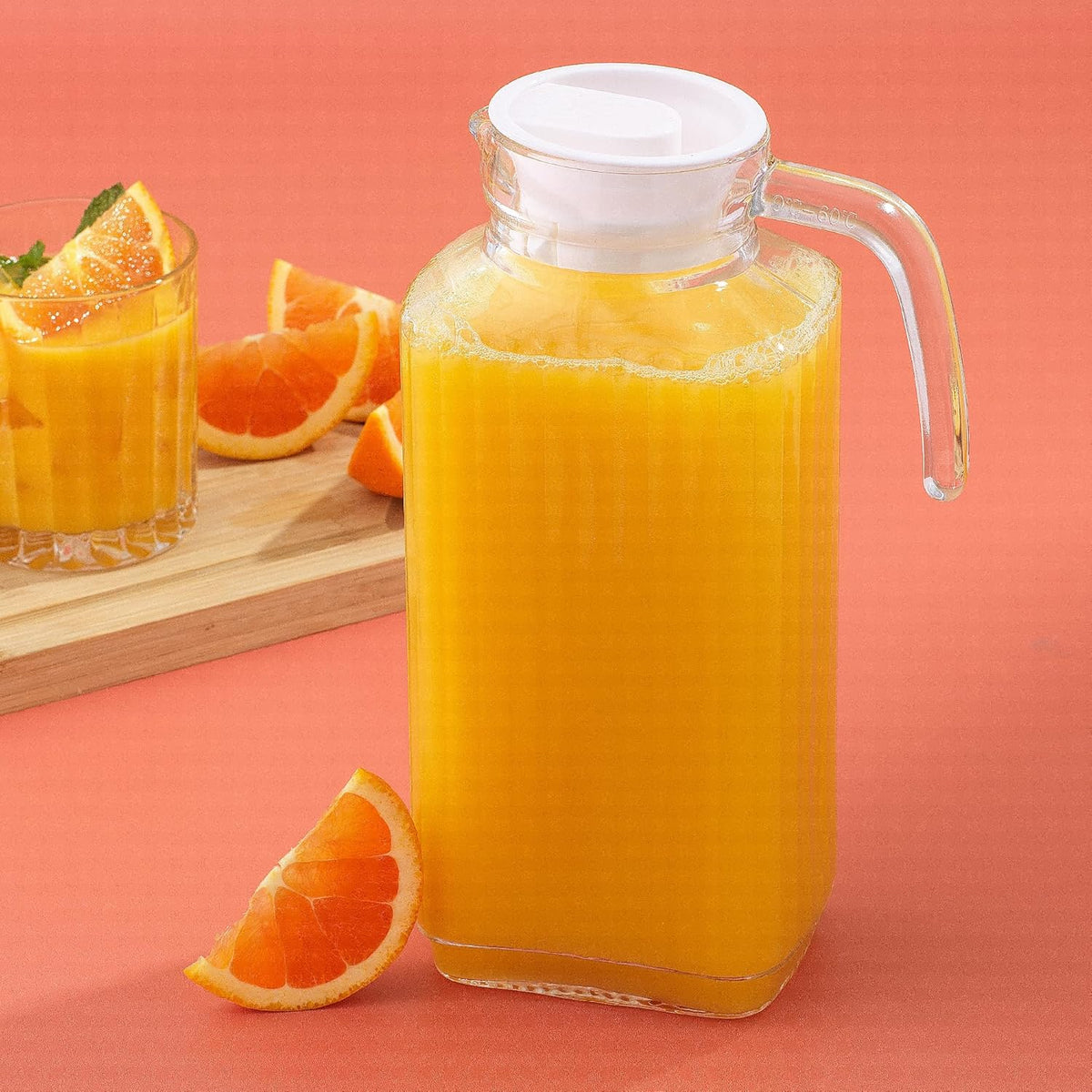 JoyJolt 60oz Glass Pitcher with Lid (2 Lids) - Beverage Serveware and Storage Container for Cold Drinks and Liquids. Juice Container, Water Jug, Fridge Pitcher for Iced Tea or Milk
