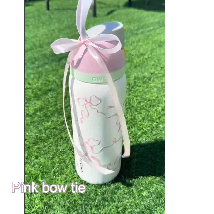 Owala FreeSip Blue Bow Tie Bottle